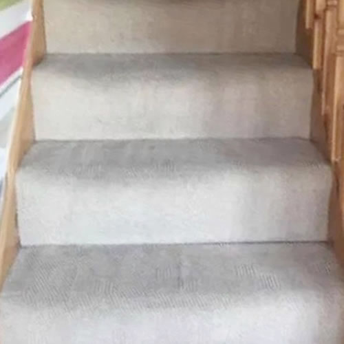 The same stair carpet clean and even in colour after professional carpet cleaning